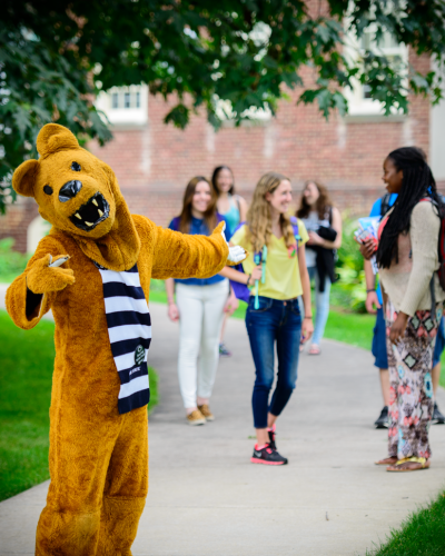 Nittany Lion - Undergrad Apply Nittany Lion welcoming you with students in the background